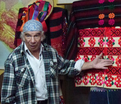 Don Sergio Castro explaining traditional clothing.